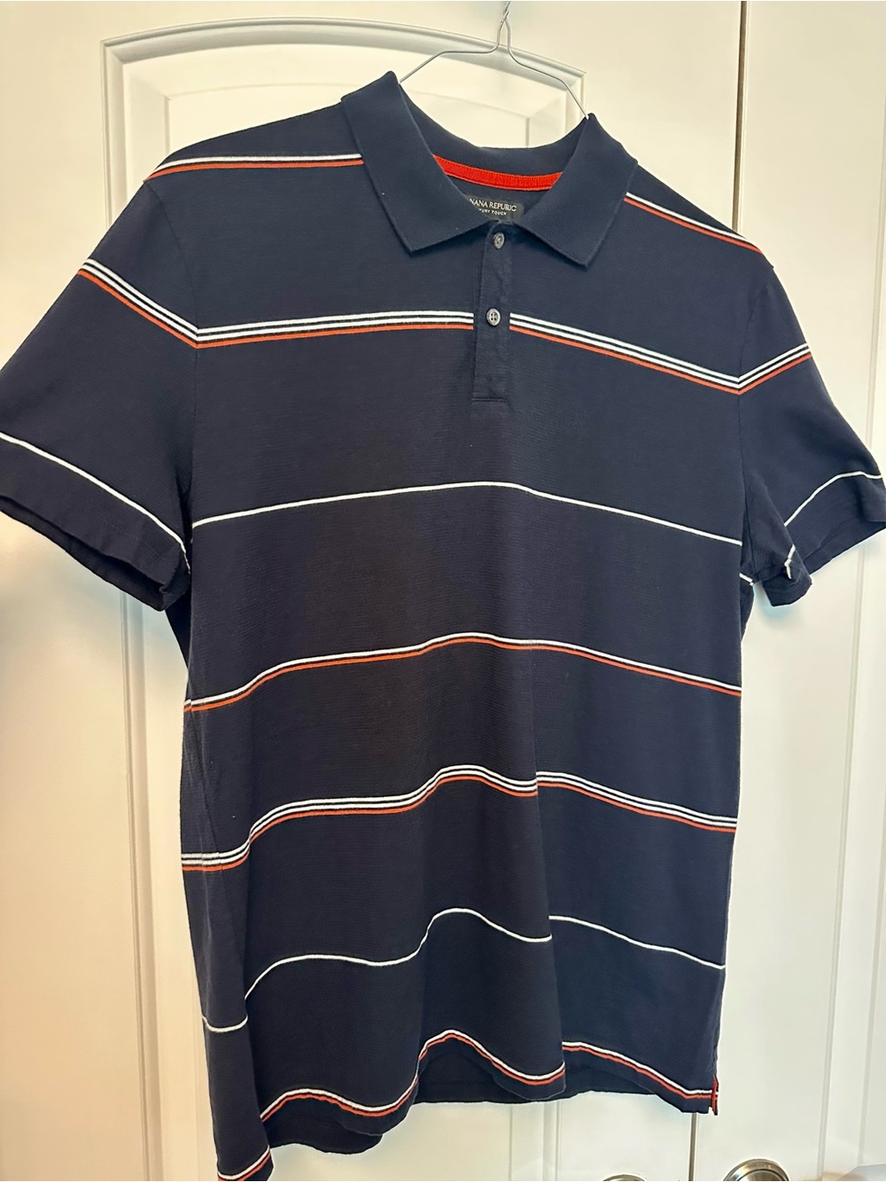 Banana Republic Luxury Touch Navy Polo with White and Orange Stripes
